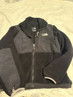 The North Face women’s Black Fleece Jacket with Zip Chest Pocket